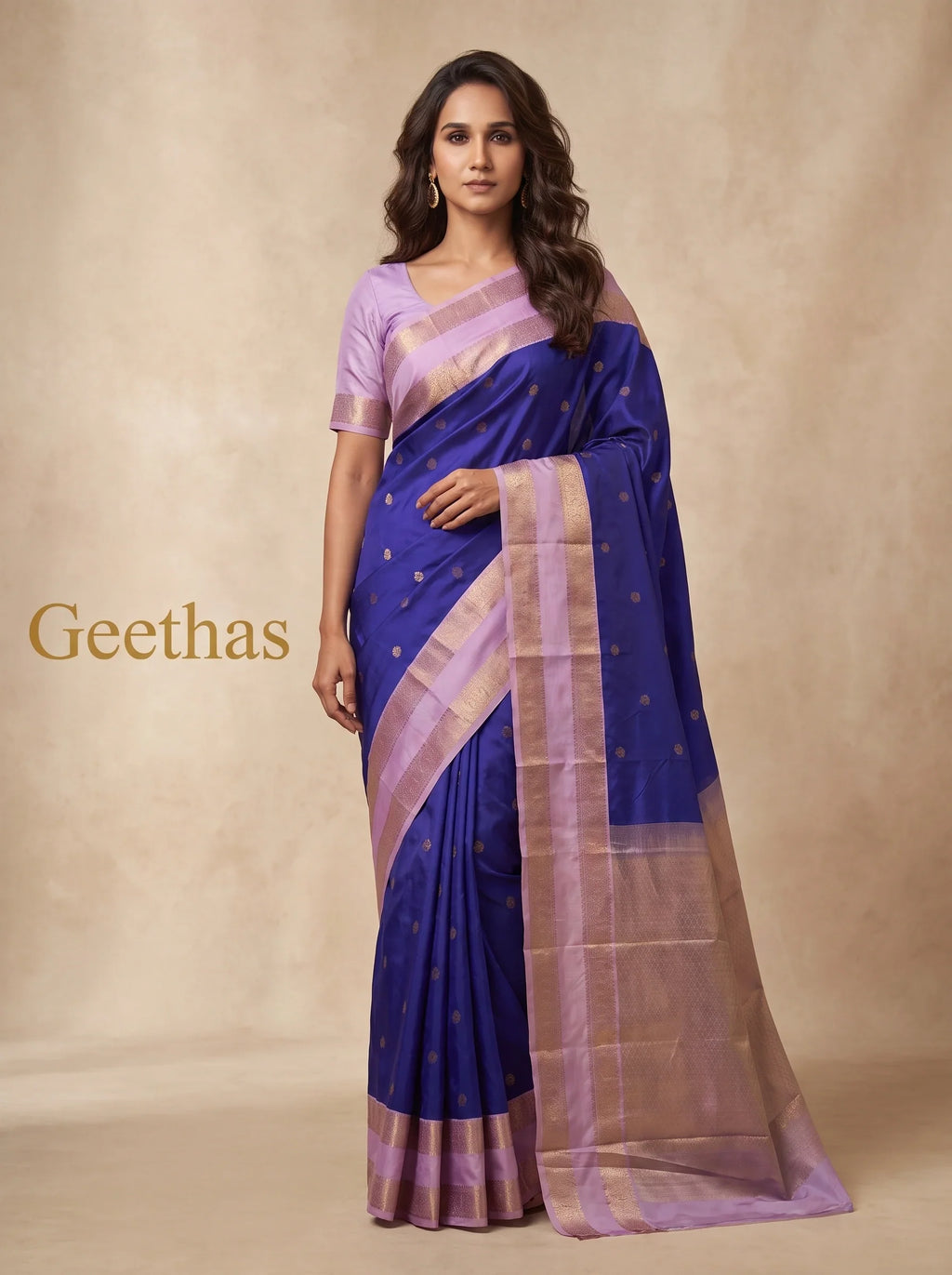 Model wearing royal blue soft silk saree with lilac zari border and woven pallu