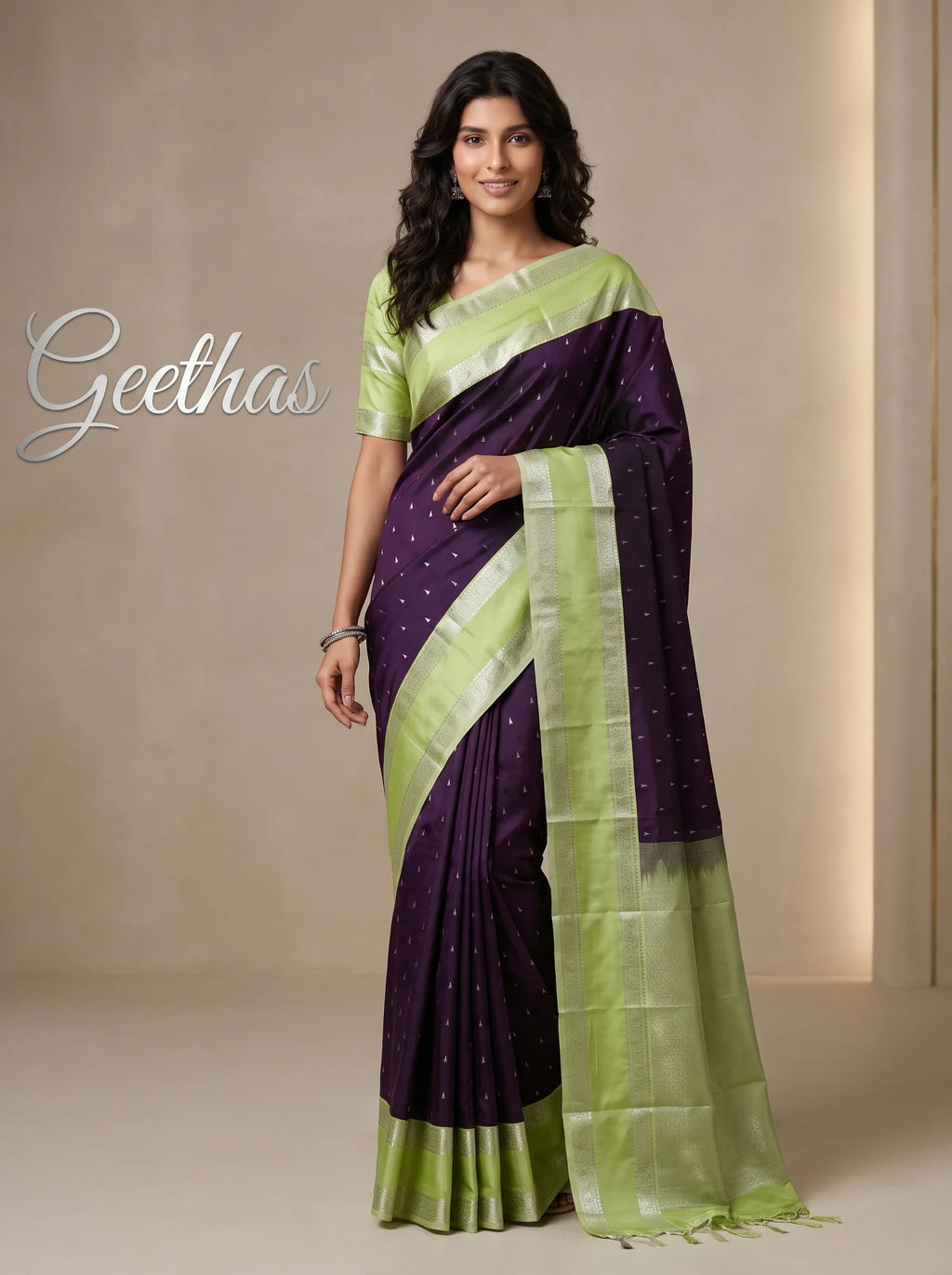 Model wearing a dark wine soft silk saree with light green woven border and pallu