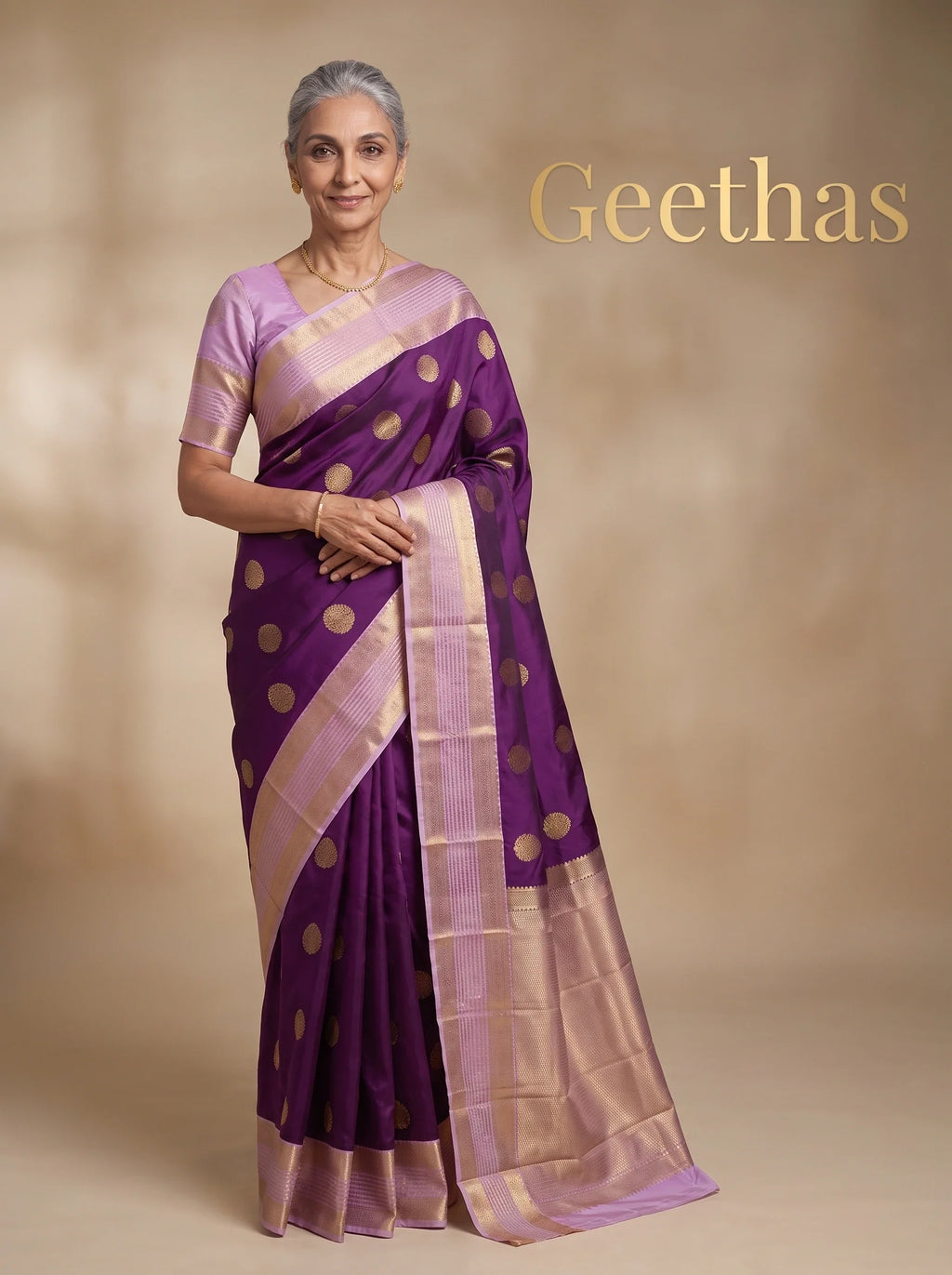 Model wearing deep purple soft silk saree with gold-toned floral motifs and lilac zari-woven border